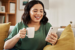 Woman on sofa with phone, coffee and smile, reading email or social media meme in living room. Networking, cellphone and happiness, girl on couch to relax, chat and internet search for post or text.