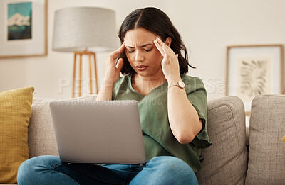 Buy stock photo Woman, home and headache with laptop learning and remote work stress on a sofa feeling frustrated. House, female person and confused from computer problem with anxiety from online website project