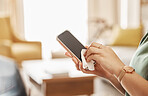 Woman, hands and wipe phone with tissue paper to prevent germs, dirt or dust bacteria at home. Hygiene, technology and closeup of female person cleaning cellphone to sanitize screen in living room.