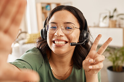 Buy stock photo Woman, call center and selfie with peace sign, happy and post with work from home office, headphones and mic. Influencer girl, telemarketing agent or crm for memory, social network or profile picture