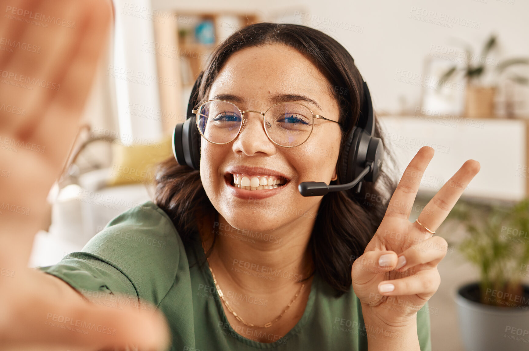 Buy stock photo Woman, call center and selfie with peace sign, happy and post with work from home office, headphones and mic. Influencer girl, telemarketing agent or crm for memory, social network or profile picture