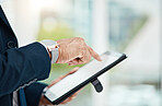 Tablet screen, hands and a person typing at work for communication, social media or contact. Closeup, corporate and an employee with technology for business, networking or email check in an office