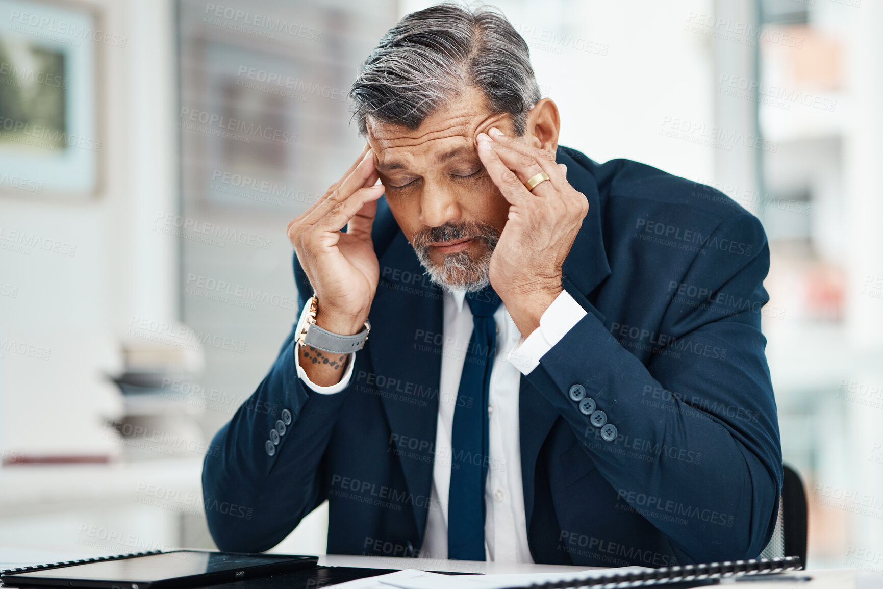 Buy stock photo Headache, pain and business man in office for financial report, mistake or problem and career crisis with documents. Stress, tired or fatigue executive, CEO or corporate person in accounting or taxes