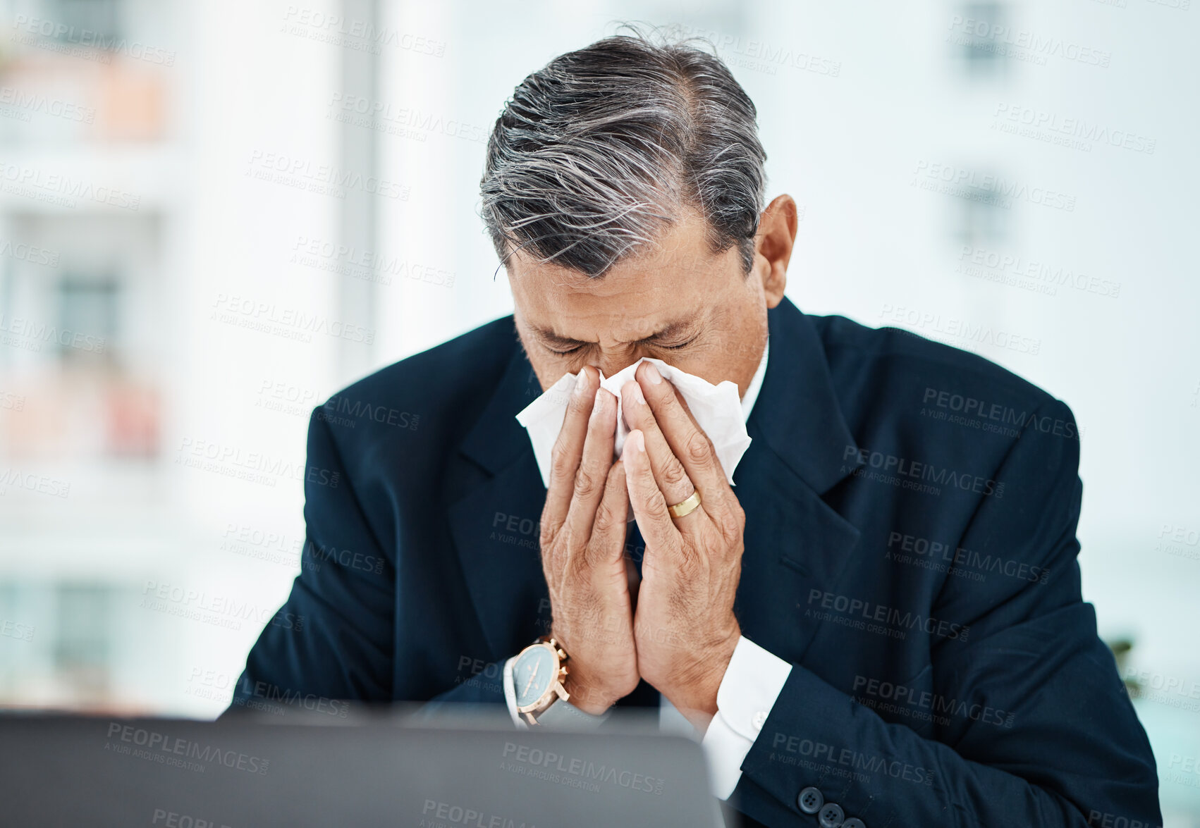 Buy stock photo Mature business man, blowing nose and sick with allergy, covid or virus in company office. Professional, tissue paper and manager with allergies for health problem, cold fever and bacteria in winter