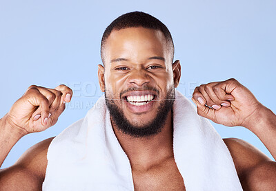 Buy stock photo Portrait, man and floss teeth for smile, dental health and care for gum gingivitis in studio. Face of happy black male model, oral thread and cleaning mouth for fresh breath, tooth hygiene and beauty