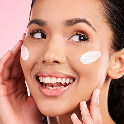 Buy stock photo Cream, beauty and face of a happy woman with skin care, dermatology and natural glow. Headshot of a young female aesthetic model with a smile for moisturizer, cosmetics or sunscreen in studio