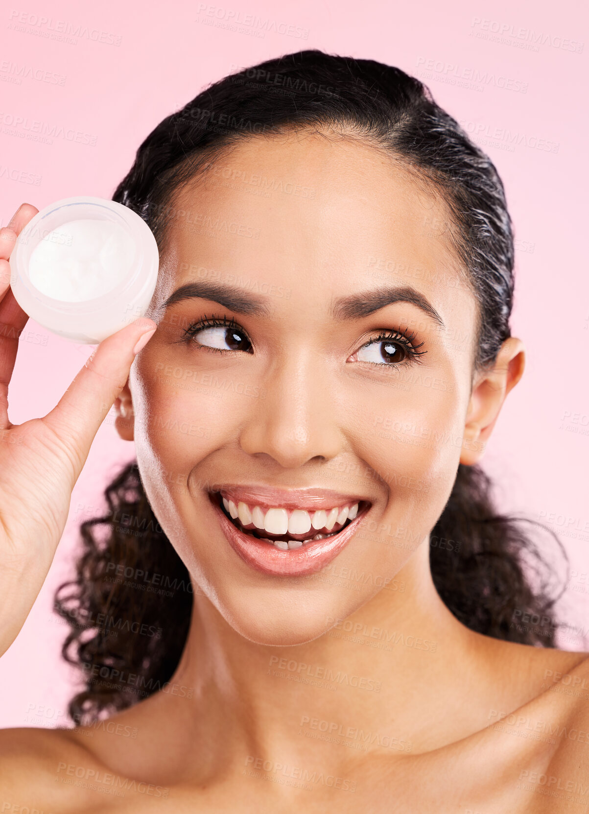 Buy stock photo Skincare, happy and woman with cream jar in studio isolated on a pink background. Smile, beauty and natural model with moisturizer container, sunscreen cosmetic and dermatology product for wellness