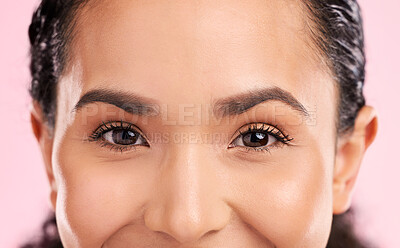 Buy stock photo Beauty, portrait and closeup of woman eyes in a studio with natural, glamour and face routine. Cosmetic, facial and zoom of young female model from Mexico with cosmetology isolated by pink background