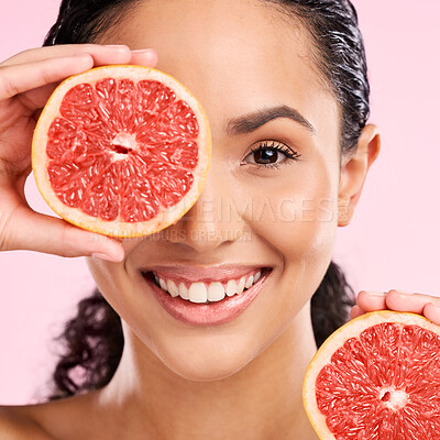 Buy stock photo Grapefruit, beauty and face portrait of a woman with skin care, dermatology and natural glow. A happy young female aesthetic model with fruit for vitamin c, cosmetics or healthy diet and nutrition