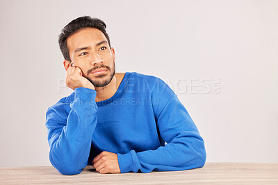 Buy stock photo Confused, thinking and space with man and idea in studio for why, brainstorming and question. Doubt, solution and choice with asian person on white background for decision, opportunity and mockup