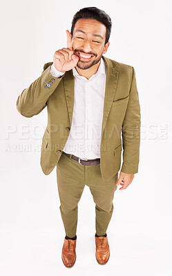 Buy stock photo Smile, excited and businessman pointing up at promotion deal isolated in a white studio background for a sale. Promo, branding and happy employee or worker showing advertising product placement