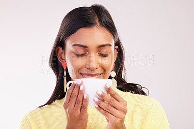 Buy stock photo Woman, coffee and smile in studio with thinking, smell and aroma with fashion, relax or drink by white background. Gen z girl, happy student and memory with cup for coco, matcha or espresso with idea