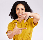 Happy woman, portrait and frame hands for photography, picture or capture against a white studio background. Female person or photographer smile framing with gesture, shape or icon for photo moment