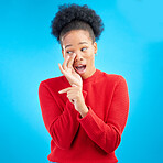 Secret, gossip and black woman in studio pointing isolated on a blue background. Happy, whisper and African person with deal, promotion or news for offer, privacy and announcement of info on mockup