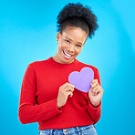 Woman, portrait and heart cut out with a smile for love and valentines day in studio. African female person, blue background and romance emoji icon for kindness with a young happy model and paper