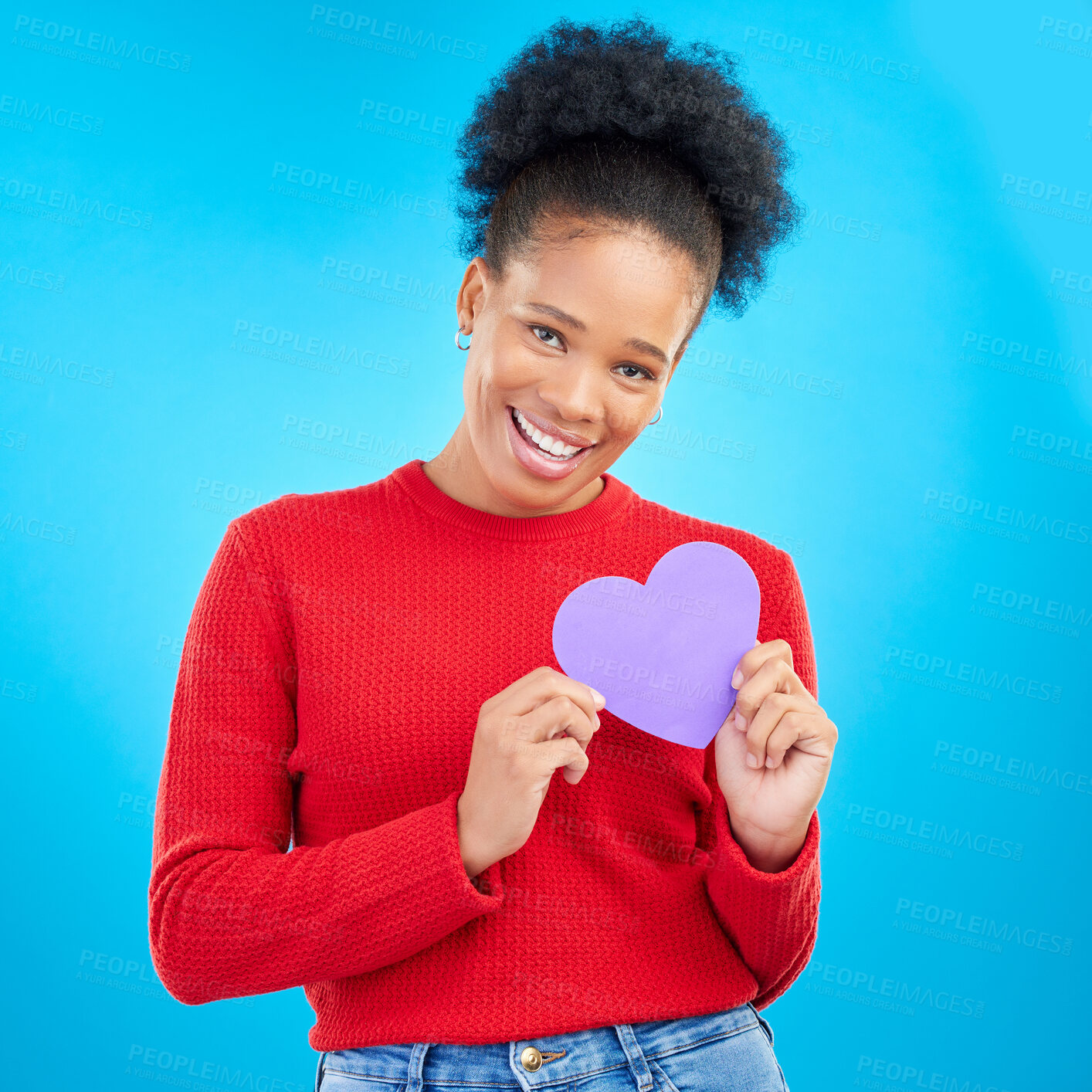 Buy stock photo Woman, portrait and heart cut out with a smile for love and valentines day in studio. African female person, blue background and romance emoji icon for kindness with a young happy model and paper