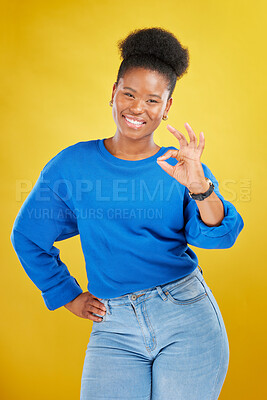 Buy stock photo Portrait, black woman and ok sign with a smile, review and feedback against a yellow studio background. Female person, gen z and model with perfect symbol, emoji and happiness with like, icon and yes