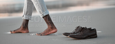 Buy stock photo Shoes, walk and beach for business man, freedom and sunset to relax in nature by water after work. Person, ground and ocean with barefoot adventure for vacation, outdoor and steps on sand at dusk