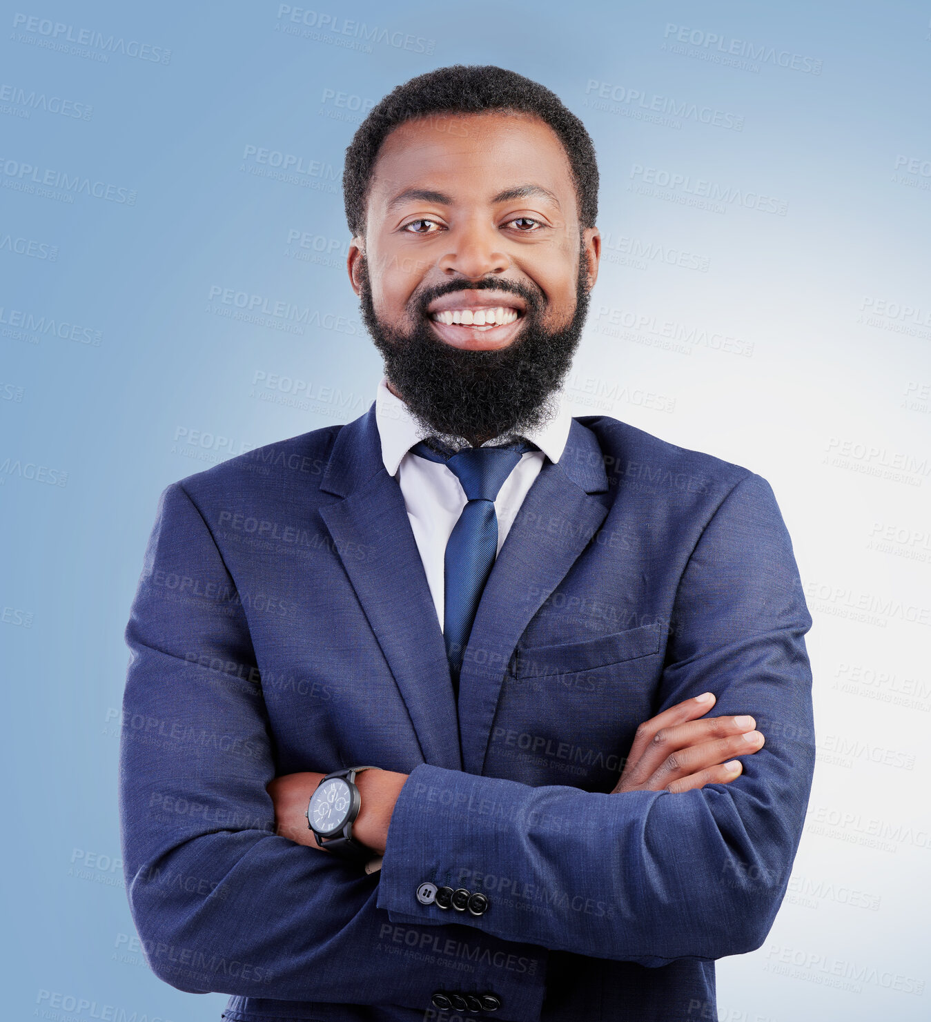 Buy stock photo Happy, crossed arms and portrait of businessman in a studio with success, confidence and leadership. Smile, professional and headshot of a young, smart and African lawyer isolated by blue background.