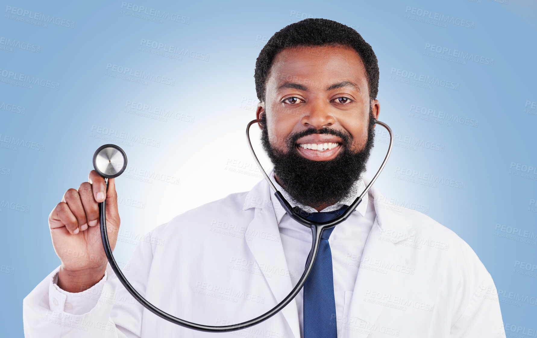 Buy stock photo Portrait, stethoscope and man doctor in studio with cardiovascular, exam or consultation on blue background. Heart, health and African male surgeon with medical tool for heartbeat and breathing