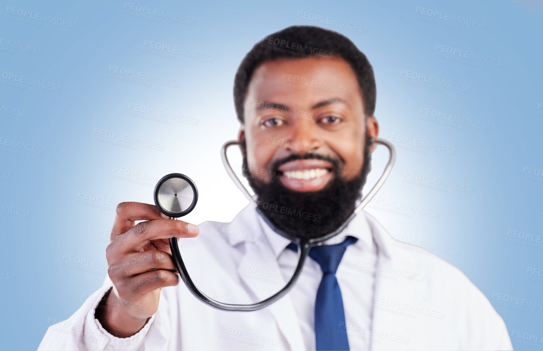 Buy stock photo Stethoscope, portrait and man doctor in studio with cardiovascular, exam or promo deal on blue background. Heart, health and African guy surgeon with medical tool for heartbeat, lung and breath check