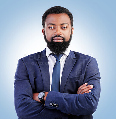 Buy stock photo Serious, crossed arms and portrait of businessman in a studio with success, confidence and leadership. Pride, professional and headshot of a young, male and African lawyer isolated by blue background