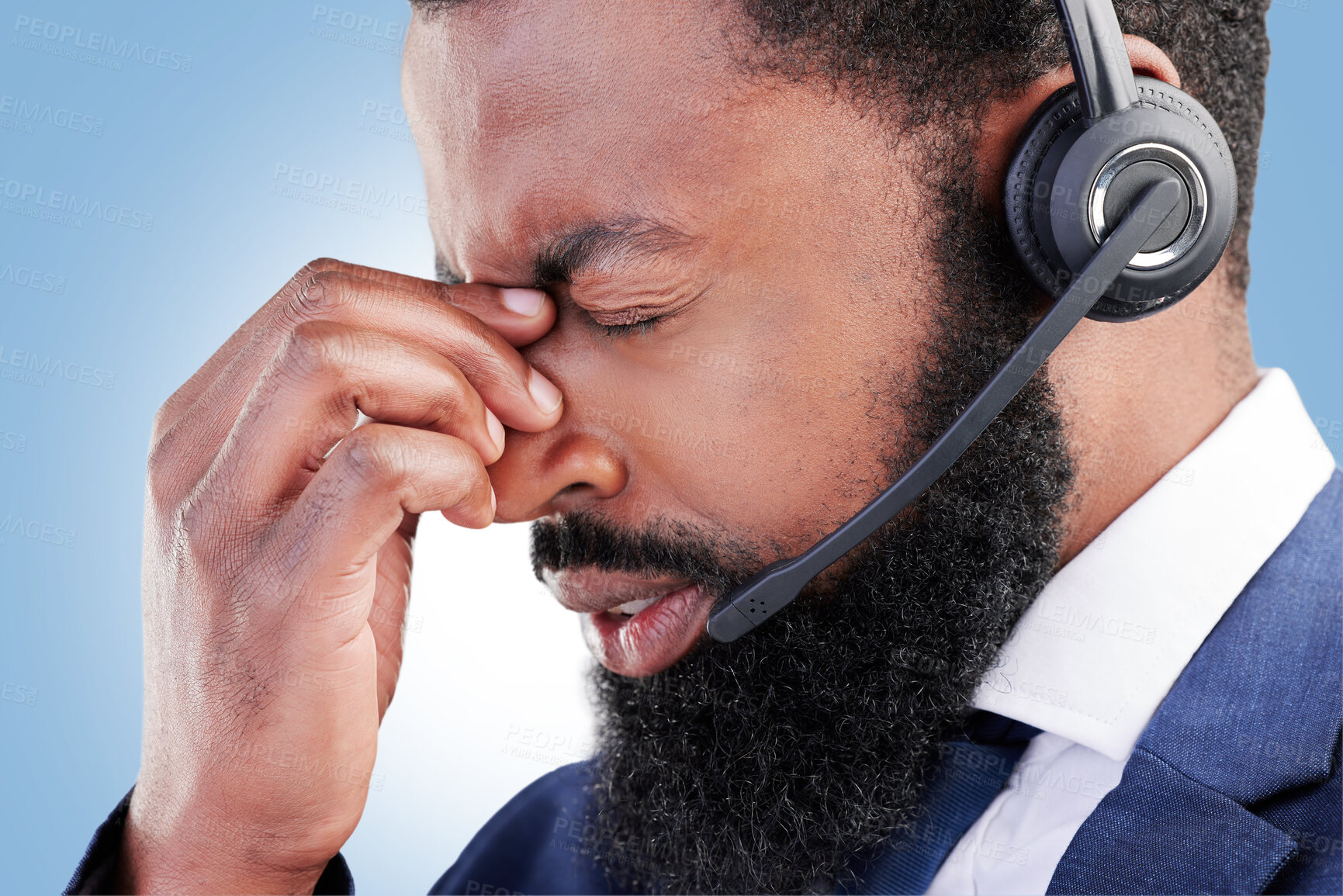 Buy stock photo Customer service face, studio black man and sad over consultation mistake, help desk problem or telemarketing burnout. Mental health, call center fail and African person depressed on blue background