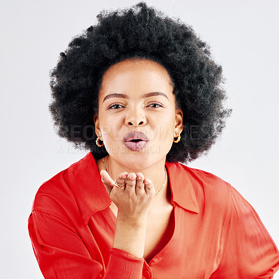 Buy stock photo Portrait, happy and black woman blowing a kiss, flirty and seductive against a white studio background. Face, female person or model being alluring, kissing or love with romantic gesture or happiness