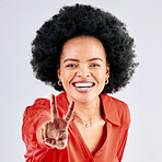 Happy, peace sign and portrait of a black woman on a studio background with an emoji. Smile, funny model and an African girl or employee with a hand gesture isolated on a backdrop for comedy