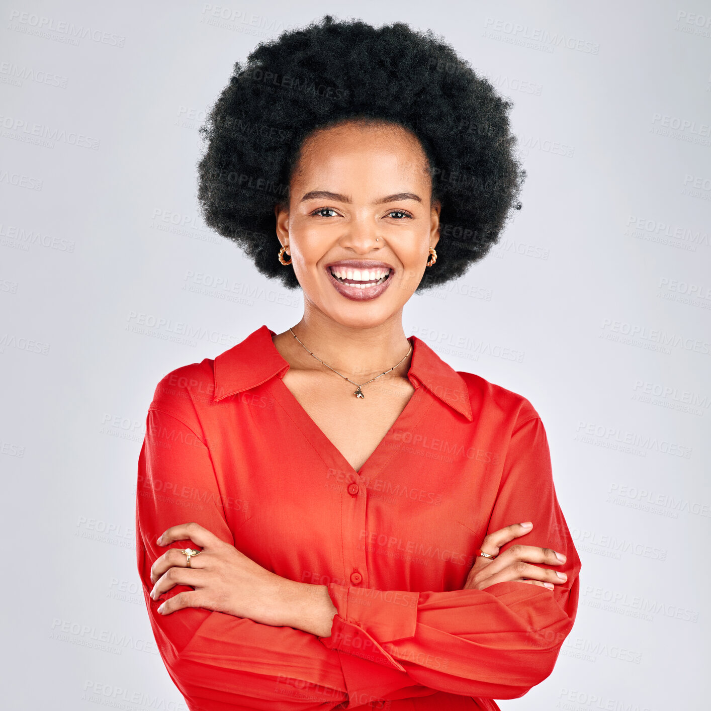 Buy stock photo Happy black woman, portrait and afro with arms crossed in fashion against a white studio background. African female person smile in confidence for career ambition, pride or proud with clothing style