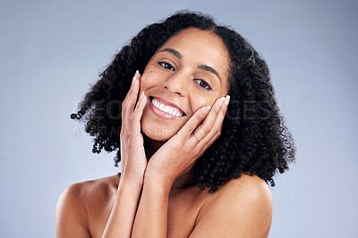 Buy stock photo Happy, beauty and portrait of a woman with hands on face for dermatology, cosmetics and natural makeup. Headshot of African female model on studio background for facial skin care, glow and soft touch