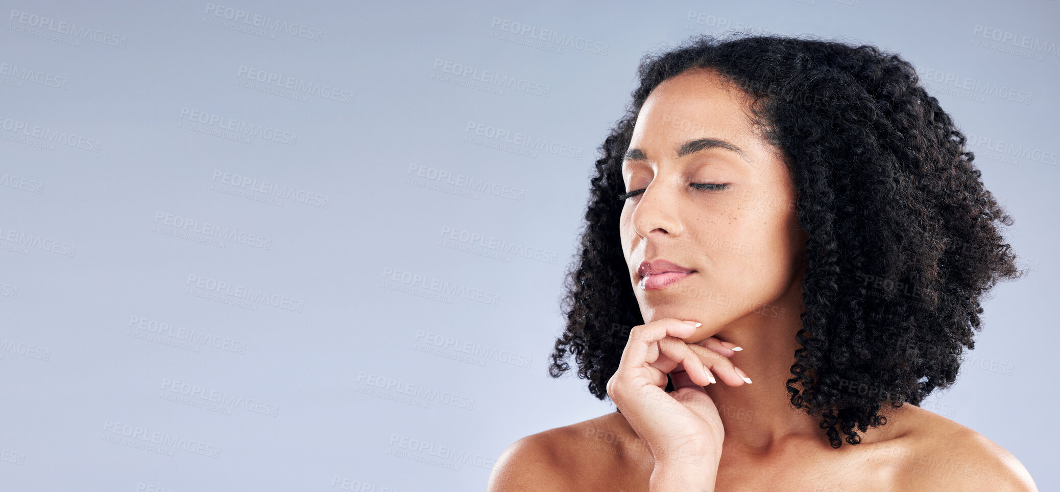 Buy stock photo Face, beauty and mockup with a woman eyes closed in studio on a gray background for skincare. Facial, skin and space with a young female model advertising or marketing natural and luxury wellness