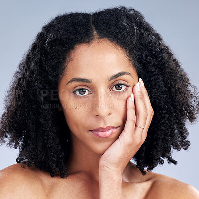 Buy stock photo Portrait, beauty and natural with a model woman in studio on a gray background for skincare. Face, aesthetic and skin with a young female person at the salon for luxury wellness or treatment