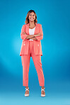 Crossed arms, fashion and portrait of business woman in studio confident for career, job and startup. Corporate boss, professional and female person with ambition, pride and goals on blue background