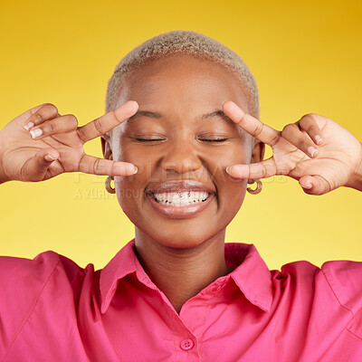 Buy stock photo Peace, hands and black woman happy in studio with thank you, vote or positive mindset on yellow background. V, sign and African female with good vibes, smile and freedom emoji, support or self love