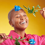 Happy, smile and spring with black woman and rose in studio for blossom, plant and environment. Gift, love and blue flower with face of person on yellow background for floral, scent and mockup