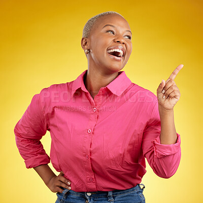 Buy stock photo Happy, black woman and hand pointing in studio for news, deal or coming soon announcement on yellow background. Finger, smile and excited African female show list, promo or sign up contact info 
