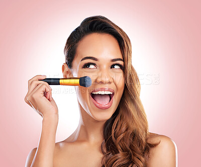 Buy stock photo Beauty, eyeshadow and face of happy woman with makeup brush for salon, wellness or luxury. Cosmetology, aesthetic and female person with tools for foundation, cosmetics and glamour on pink background