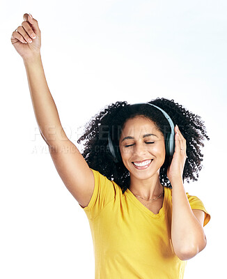 Buy stock photo Dance, music and a woman with headphones in studio streaming audio, sound or radio. Energy, happy and a young african person isolated on a white background listening and moving to fun song to relax