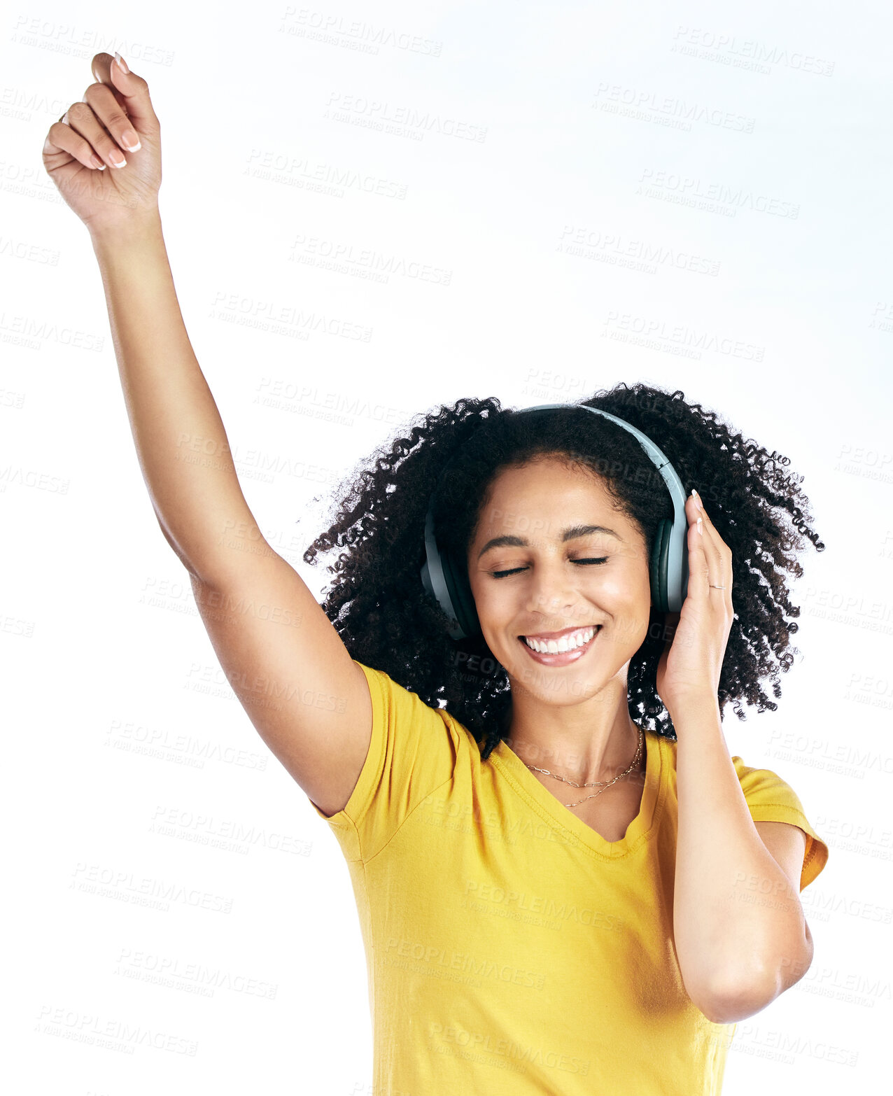 Buy stock photo Dance, music and a woman with headphones in studio streaming audio, sound or radio. Energy, happy and a young african person isolated on a white background listening and moving to fun song to relax