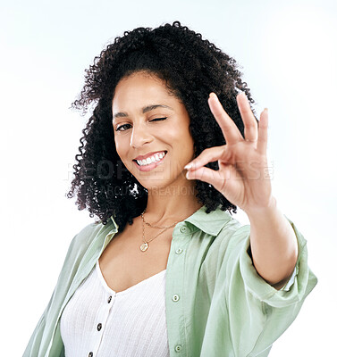 Buy stock photo Wink, studio and woman portrait with perfect hand sign for support or agree, vote or review on white background. Face, smile and emoji yes by lady with ok, approval or like, thank you or feedback