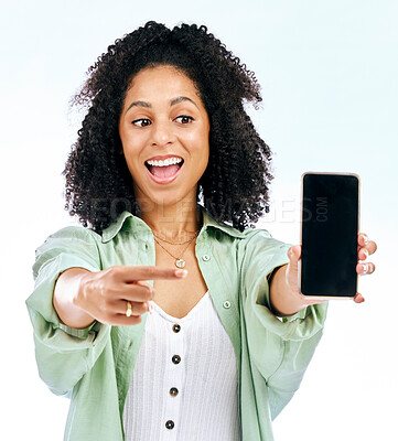 Buy stock photo Screen, mockup or woman excited by phone on white background on social media or product placement. Pointing, smile or happy person showing mobile app promo, website or tech mock up space in studio