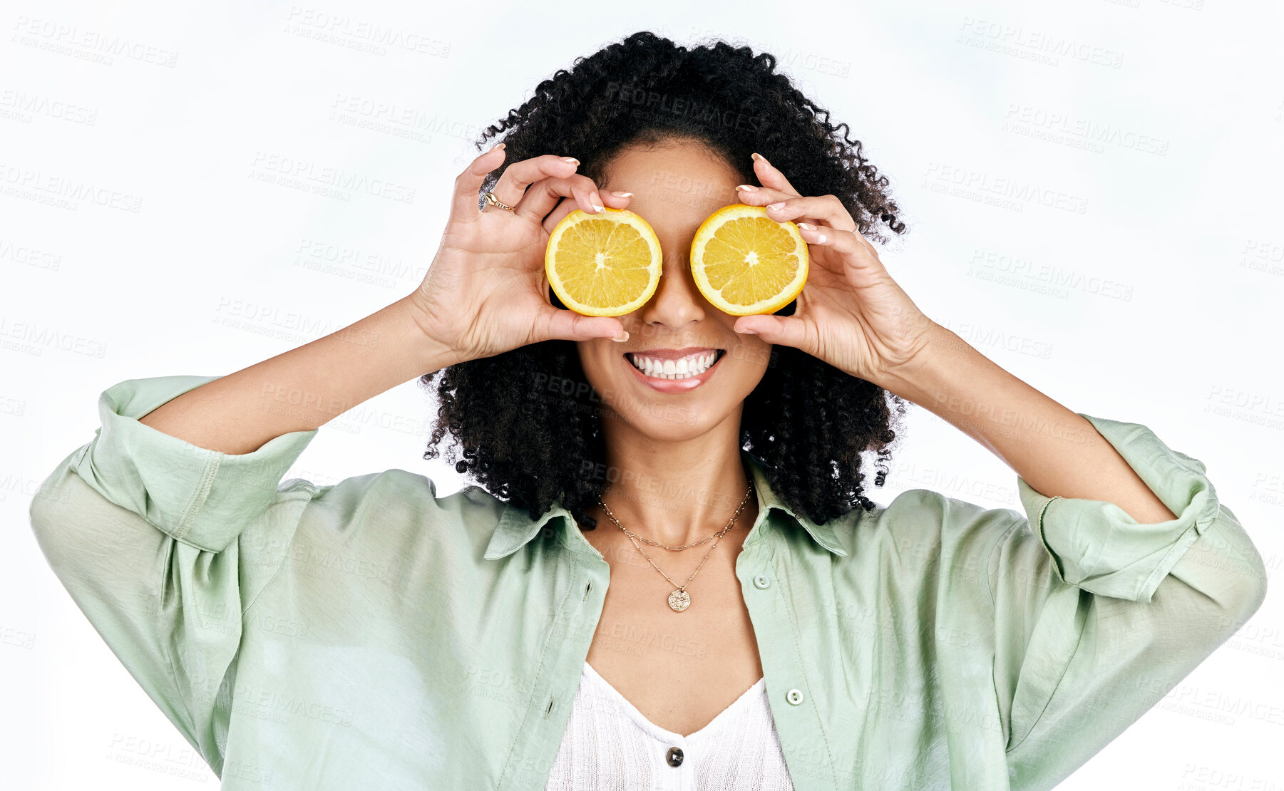 Buy stock photo Citrus, lemon and eyes of woman with fashion for organic wellness isolated in studio white background. Diet, fruit and happy or excited young person with healthy vitamin c energy, crazy and detox