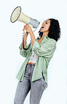 Woman, megaphone and protest leader in studio with shouting, noise and politics by white background. Isolated African girl, student and audio tech for justice, speech and change in human rights goals