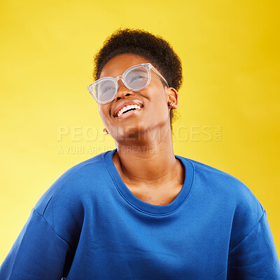 Buy stock photo Happy, fashion and glasses with face of black woman in studio for vision, eye care and trendy style. Gen z, smile and happiness with female person on yellow background for expert, health and idea