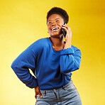Happy, phone call and black woman in studio laugh, silly or share joke on yellow background. Funny, talking and African lady with goofy, gossip or conversation on smartphone for online communication 