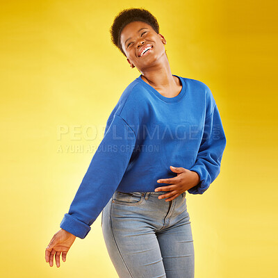Buy stock photo Happy, laughing and a black woman in studio with fashion, confidence and a positive mindset. Playful, funny and African female model person in casual clothes on a yellow background for motivation