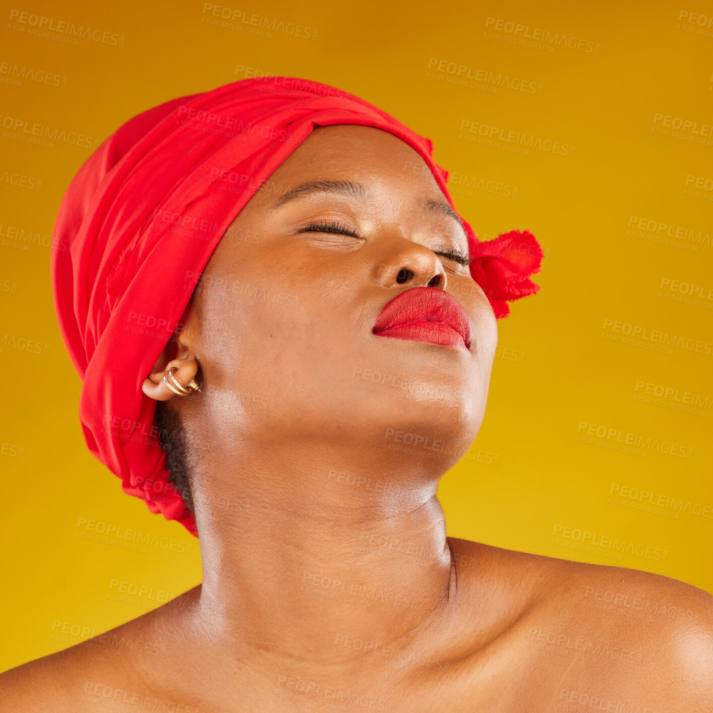 Buy stock photo Beauty, makeup and creative with face of black woman in studio for facial, red head scarf and pride. Skincare, salon and red lipstick with model on yellow background for wellness, self care and glow