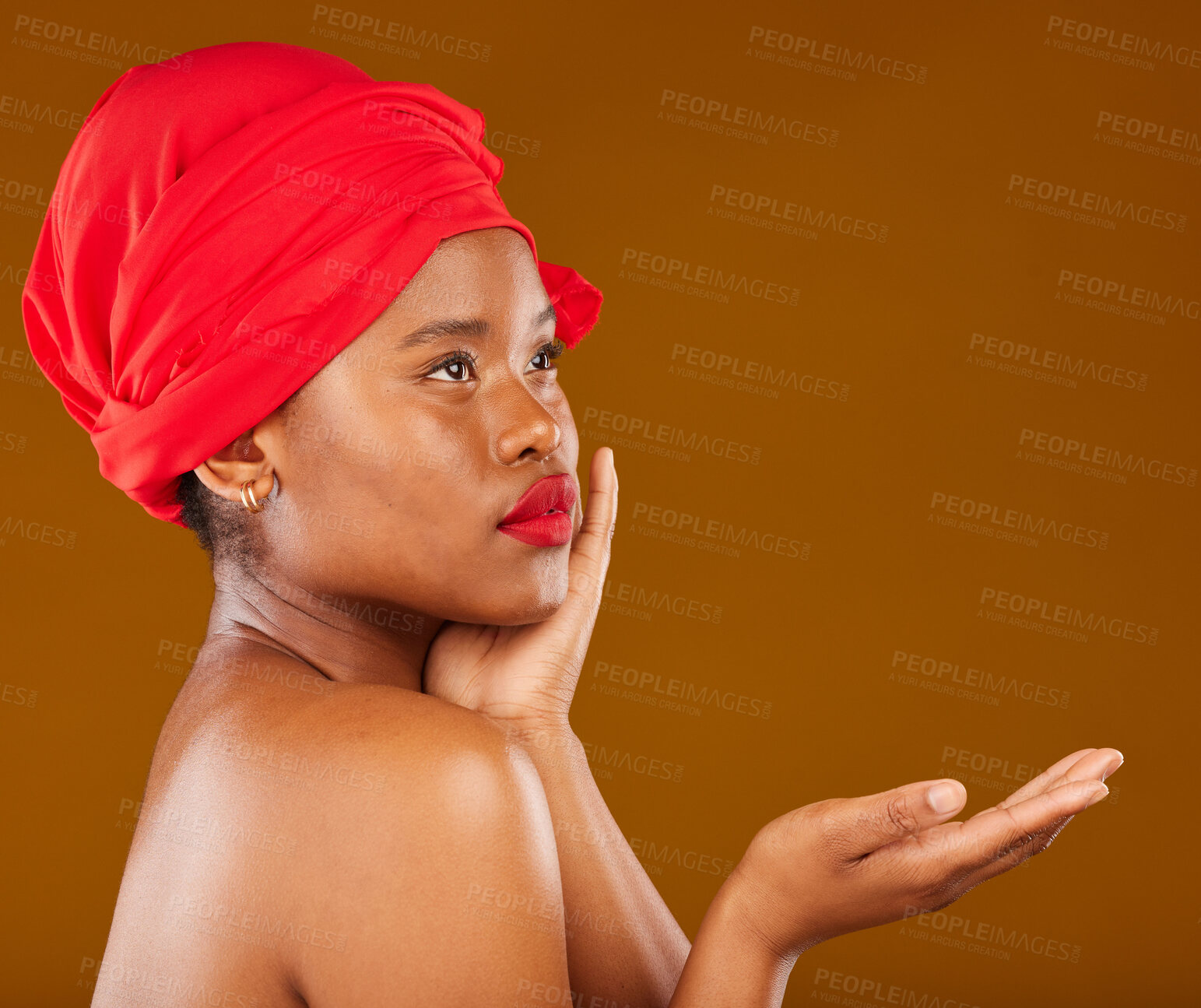 Buy stock photo Beauty, makeup and presentation with face of black woman in studio for cosmetics, creative and show. Skincare, salon and mockup with female model on brown background for wellness, self care and glow