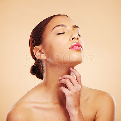 Buy stock photo Face, relax or woman with natural beauty in studio isolated on brown background for wellness or glow. Facial treatment, hand or Brazilian girl model touch neck in self love, eyes closed or cosmetics